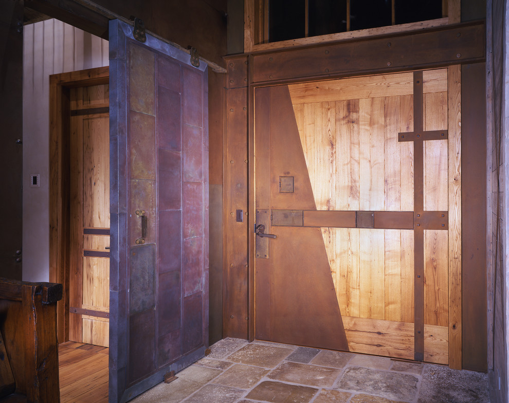 Inspiration for a rustic entryway remodel in Denver