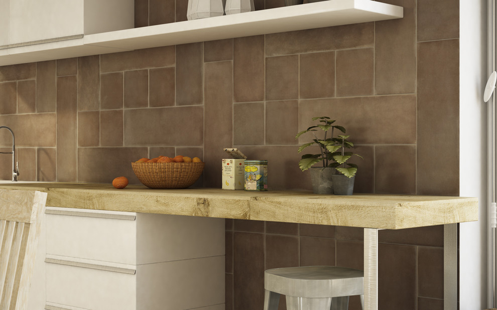 Kitchen - transitional kitchen idea in New York with brown backsplash and ceramic backsplash