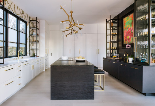 Modern kitchen with white cabinets and dark island—perfectly level cabinet run along the wall
