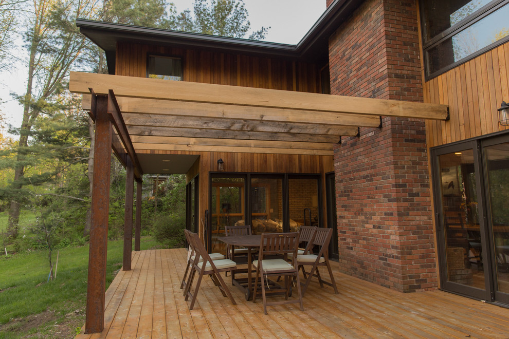 Design ideas for a contemporary exterior in Burlington with wood siding.