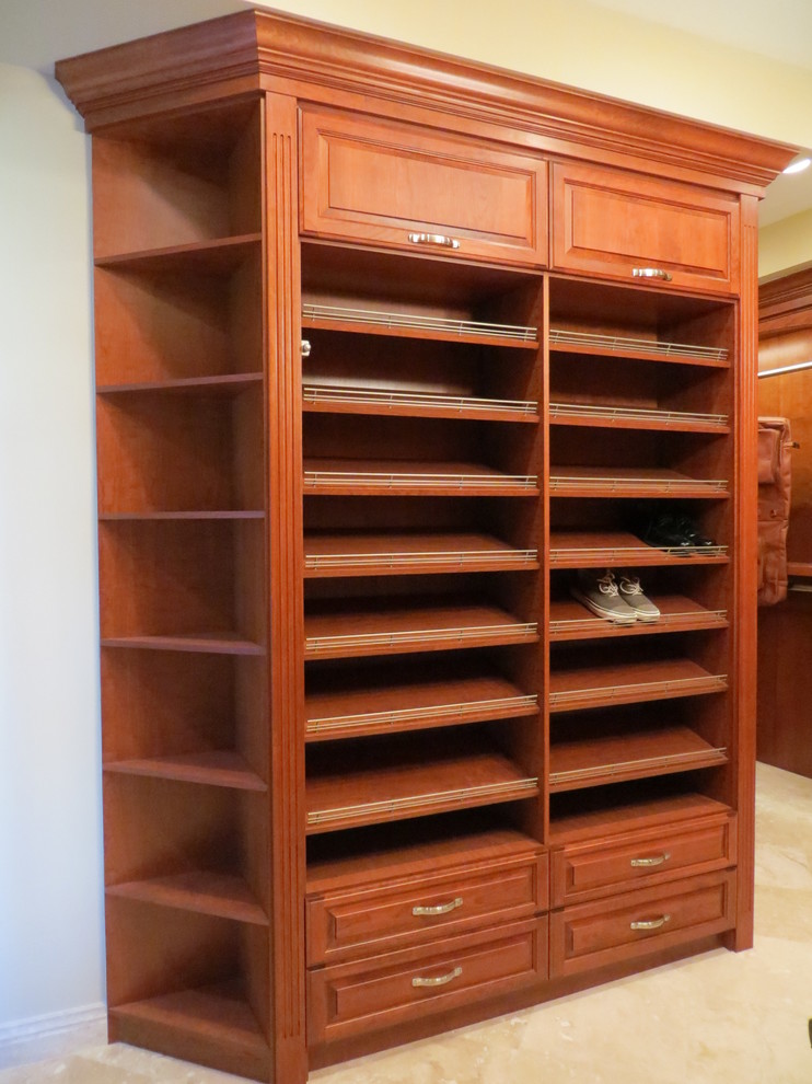 Design ideas for a large traditional wardrobe in Chicago.