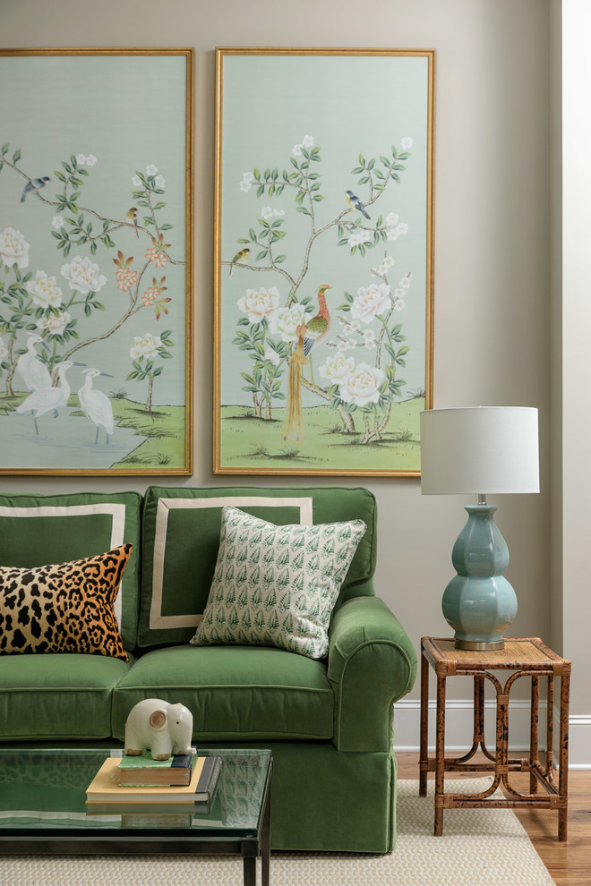 Inspiration for a mid-sized traditional enclosed living room in Other with grey walls and medium hardwood floors.