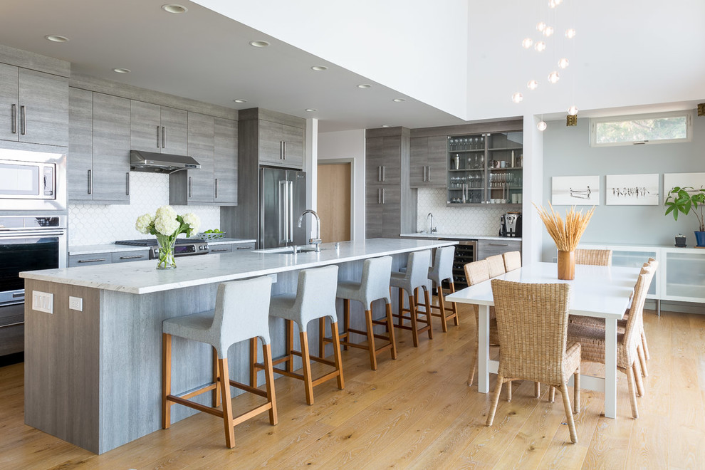 Inspiration for a contemporary open plan dining in Seattle with grey walls, light hardwood floors and yellow floor.