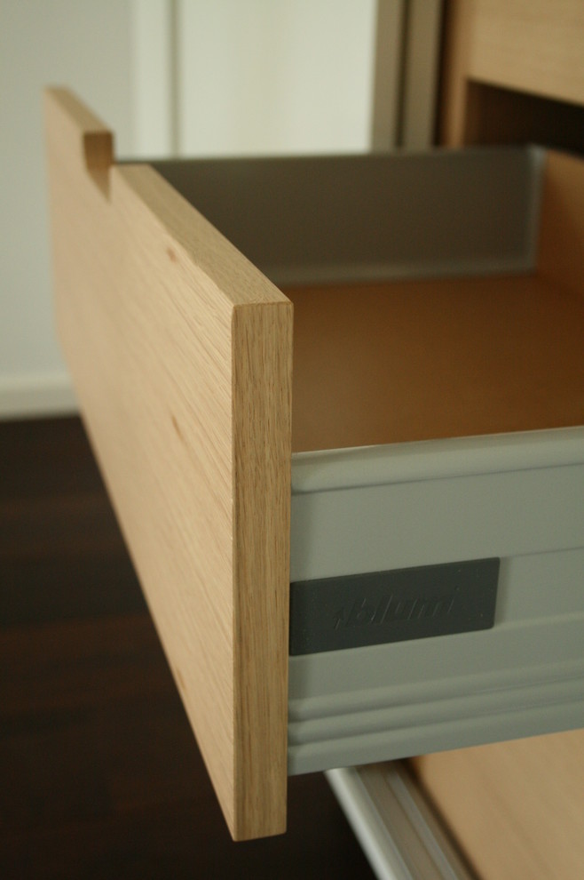 This is an example of a contemporary dining room in Brisbane.