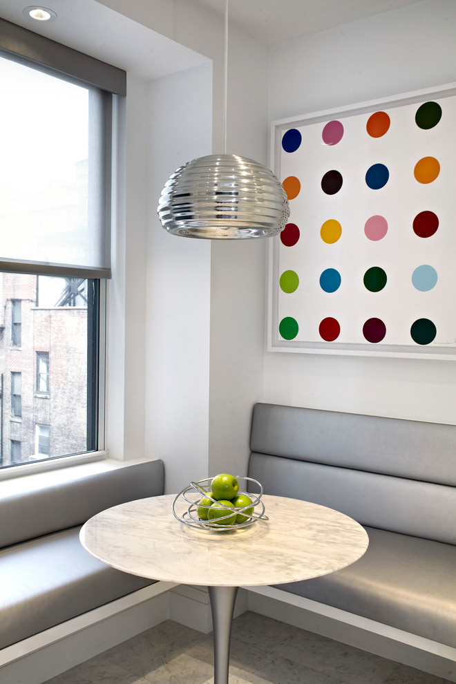 Trendy dining room photo in New York with white walls