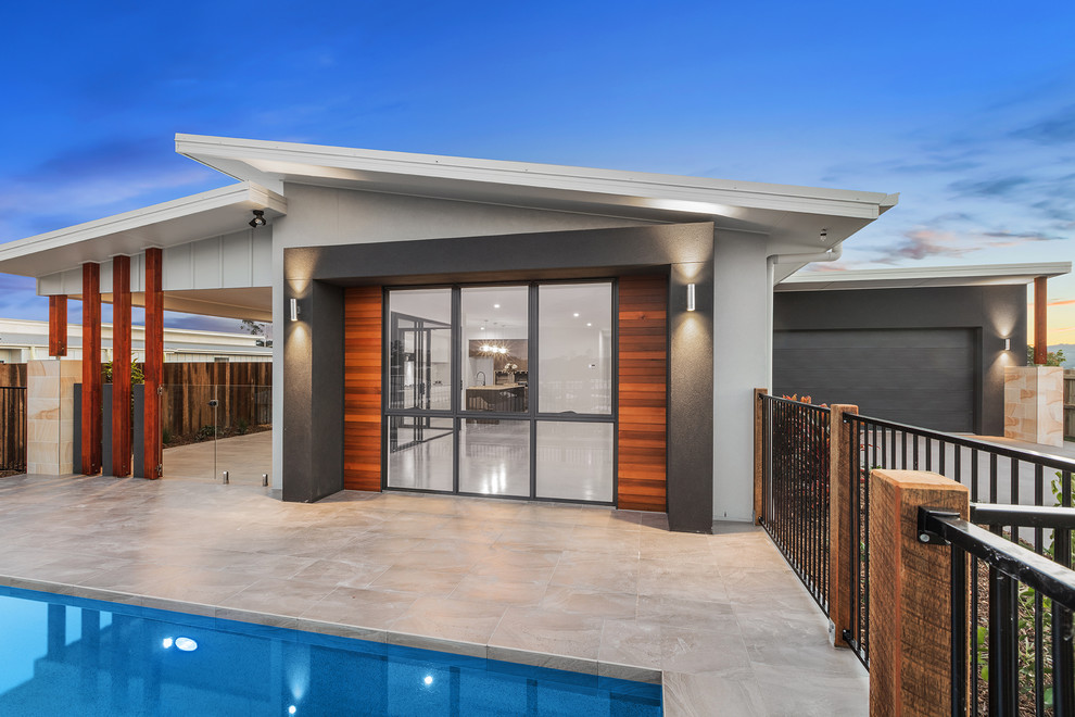 Design ideas for a mid-sized contemporary exterior in Sunshine Coast.