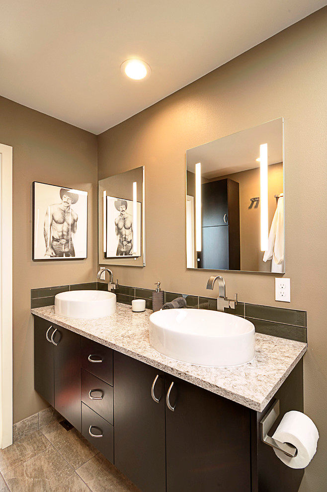 This is an example of a mid-sized modern master bathroom in Seattle with flat-panel cabinets, dark wood cabinets, an alcove shower, a one-piece toilet, beige tile, porcelain tile, beige walls, porcelain floors, a vessel sink, engineered quartz benchtops, beige floor and an open shower.