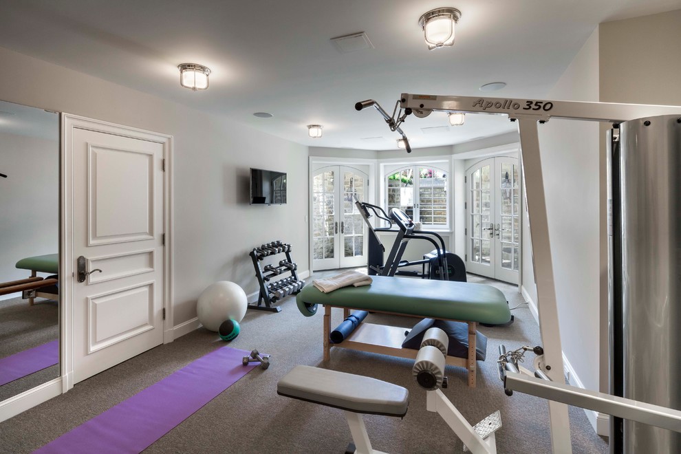 Mid-sized eclectic multipurpose gym in Other with white walls, carpet and grey floor.