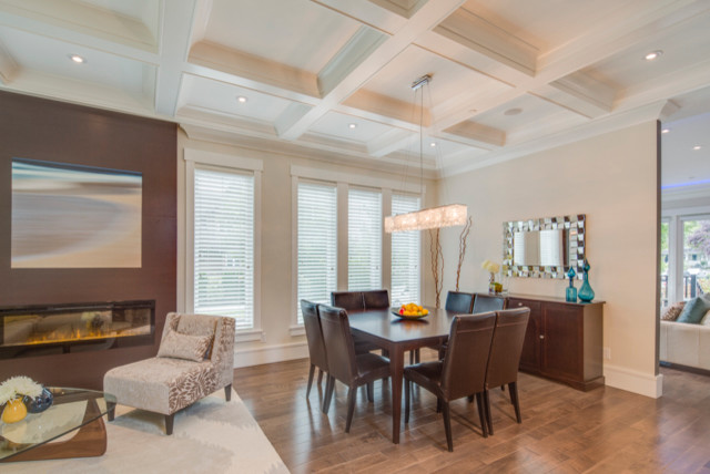 This is an example of a transitional dining room in Vancouver.