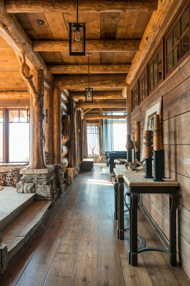 Inspiration for a rustic dark wood floor hallway remodel