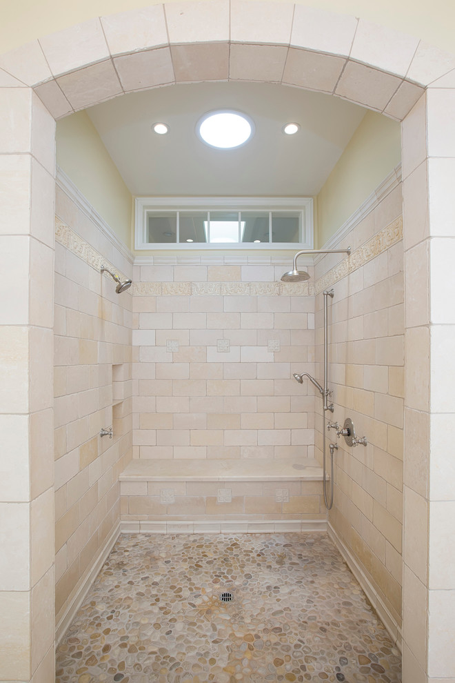 This is an example of a large traditional master bathroom in San Diego with an undermount sink, raised-panel cabinets, white cabinets, granite benchtops, an open shower, a two-piece toilet, beige tile, stone tile, yellow walls and travertine floors.