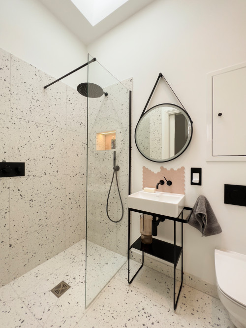 Inviting Walk-in Showers with Black Hardware and Terrazzo Walls
