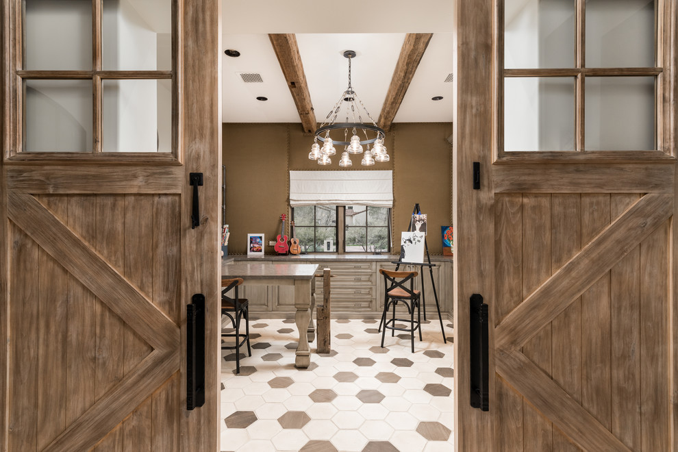 Inspiration for an expansive country hallway in Phoenix with white walls, dark hardwood floors and brown floor.