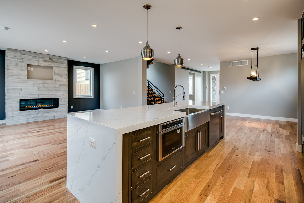 This is an example of a transitional kitchen in Denver.