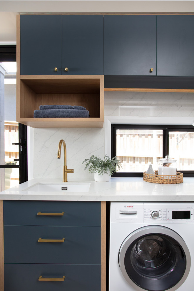Contemporary laundry room in Brisbane.