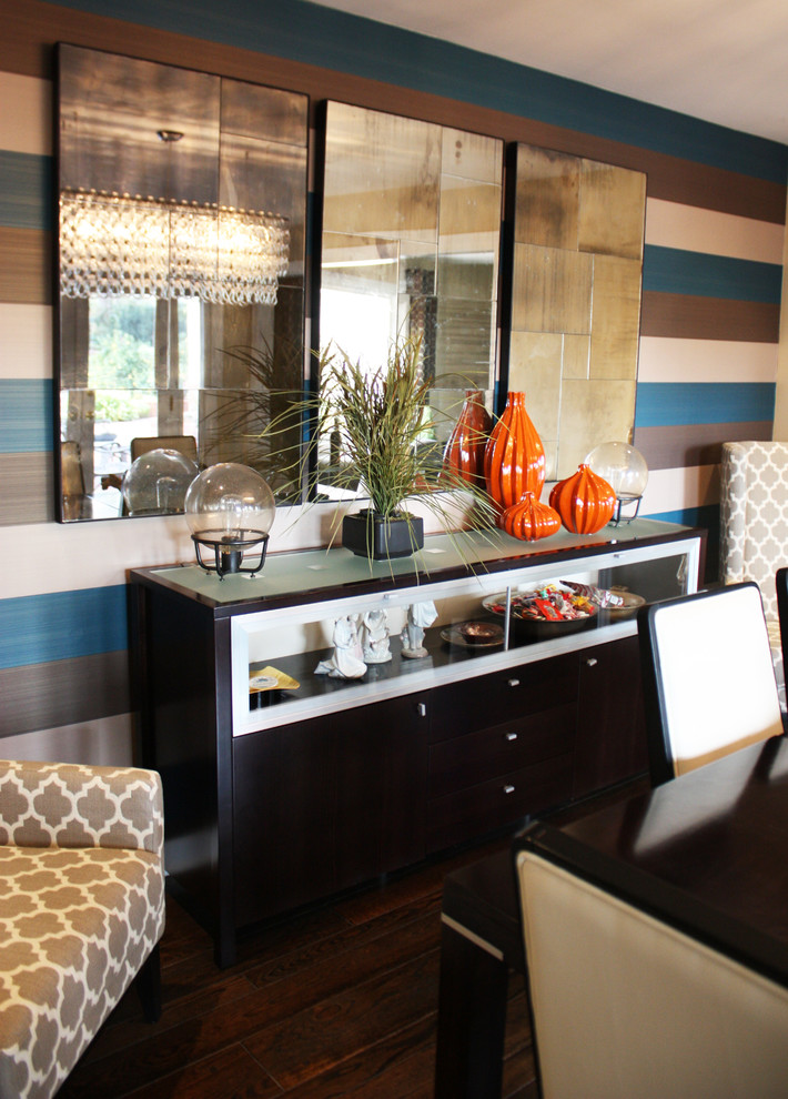 Mid-sized contemporary separate dining room in Orange County with multi-coloured walls and dark hardwood floors.