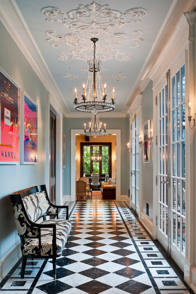 This is an example of a large traditional hallway in Philadelphia with blue walls.