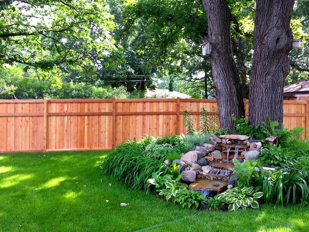 Photo of a mid-sized backyard landscaping in Minneapolis.