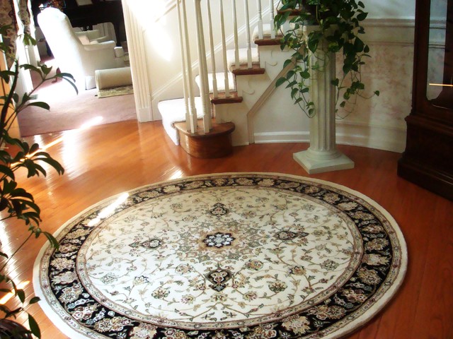 Round Rug With Curved Staircase Traditional Entrance Round Rug With Curved Staircase Traditional Entrance