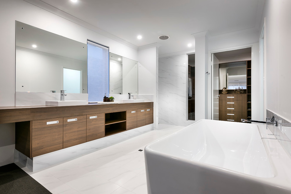 Design ideas for a large contemporary master bathroom in Perth with medium wood cabinets, a freestanding tub, an open shower, white tile and white walls.