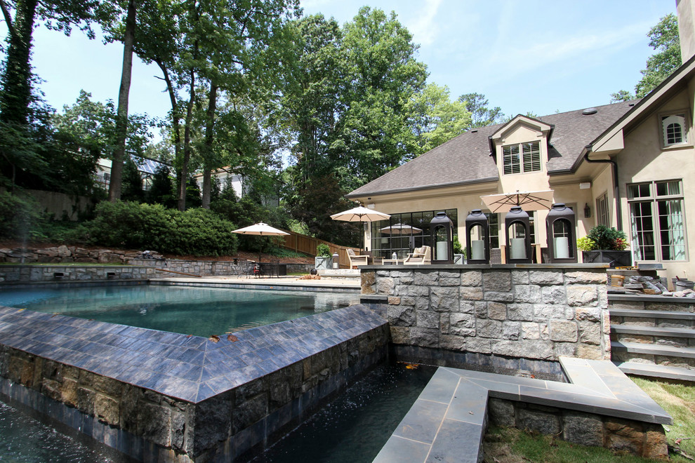Example of a transitional home design design in Atlanta