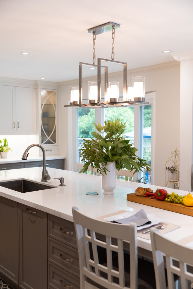 Example of a transitional kitchen design in Toronto