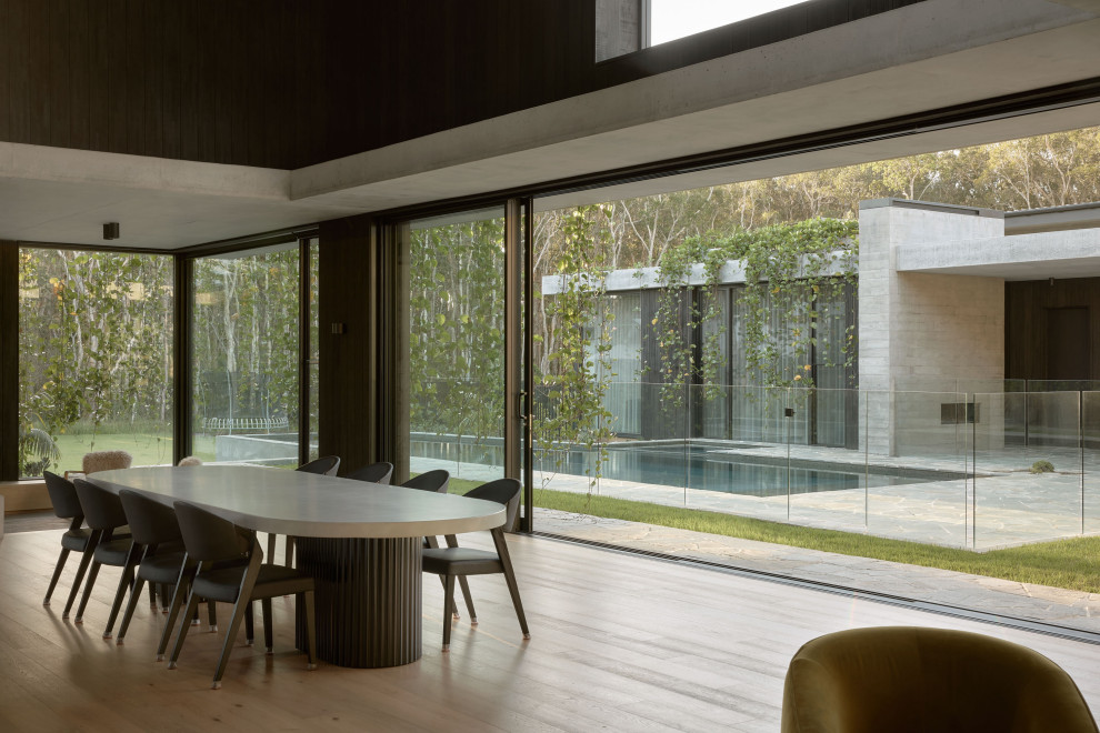 Design ideas for a modern dining room in Brisbane.