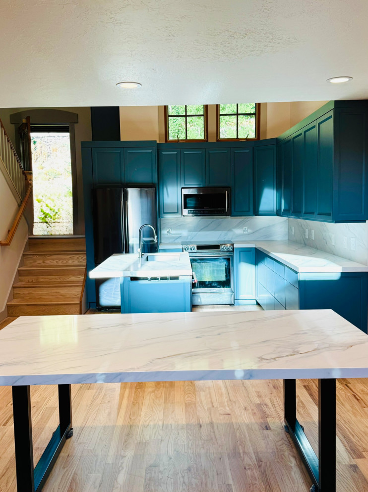 Custom kitchen cabinets, matching countertops, island, back splash, new custom t