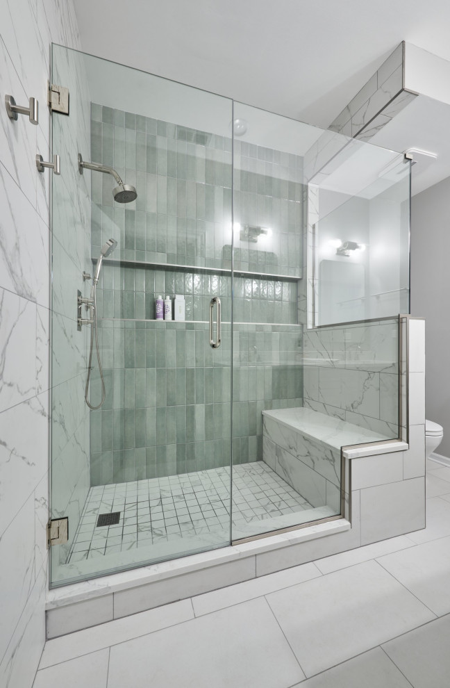 Design ideas for a medium sized classic ensuite bathroom in Chicago with recessed-panel cabinets, green cabinets, a corner shower, green tiles, porcelain tiles, white walls, porcelain flooring, a submerged sink, quartz worktops, white floors, a hinged door, white worktops, a shower bench, double sinks and a freestanding vanity unit.