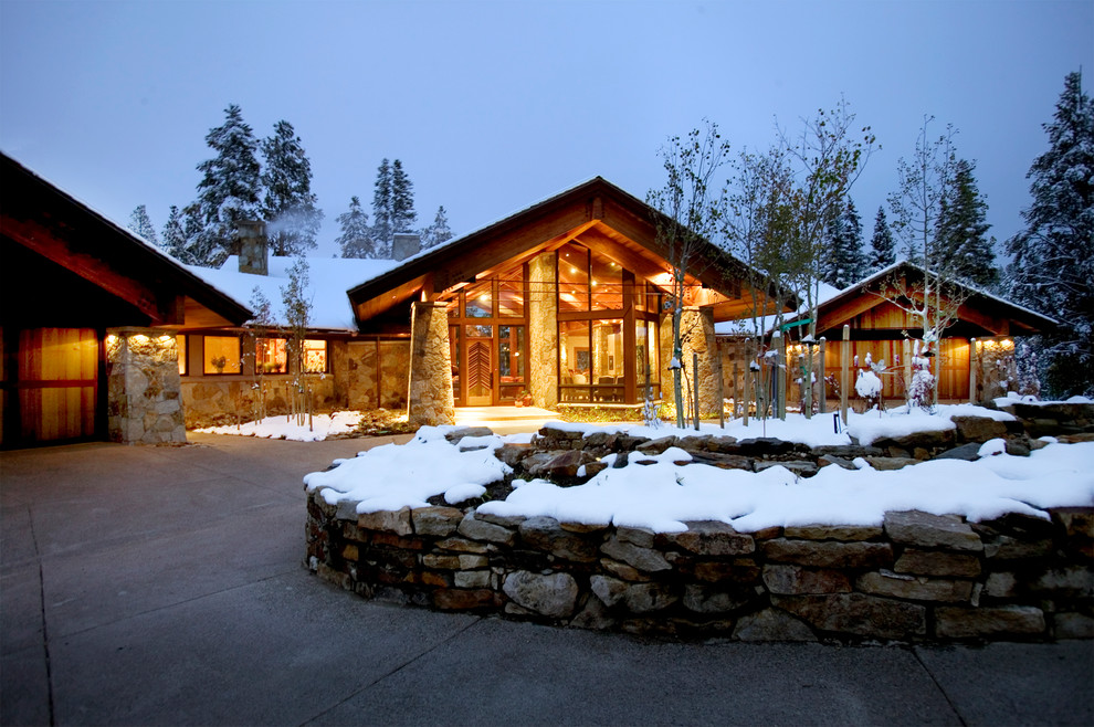 Photo of a country exterior in Denver with stone veneer.