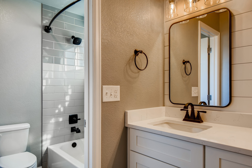Design ideas for a small contemporary master bathroom in Denver with recessed-panel cabinets, white cabinets, white tile, grey walls, white benchtops, a double vanity and a built-in vanity.