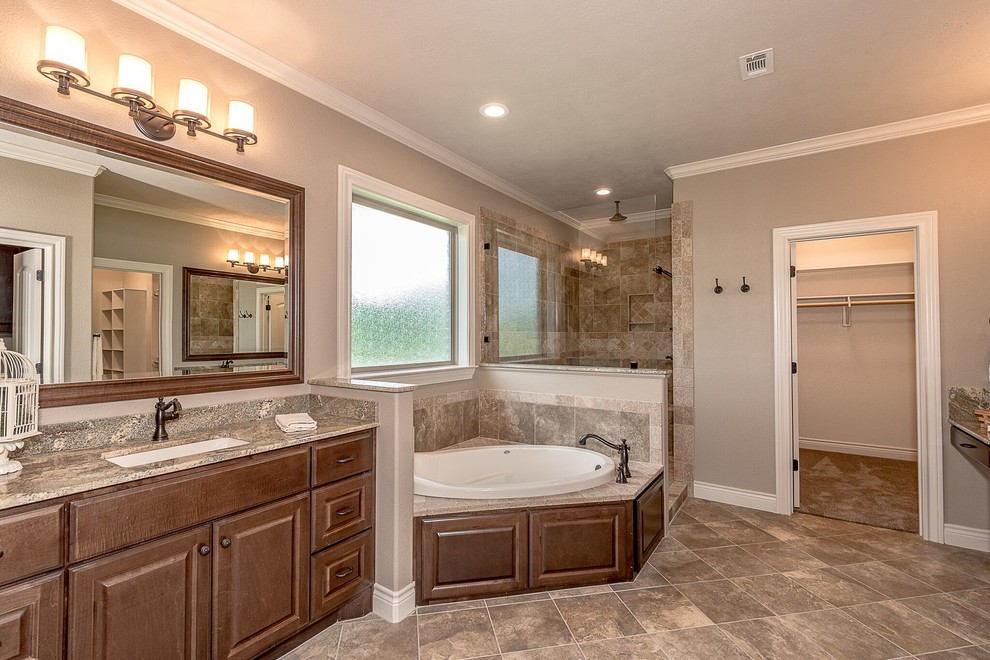 Mid-sized country bathroom in Austin with beige walls, medium hardwood floors and brown floor.