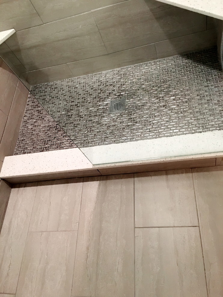 Inspiration for a mid-sized transitional beige tile, brown tile and porcelain tile porcelain tile and beige floor alcove shower remodel in Detroit with a two-piece toilet and beige walls