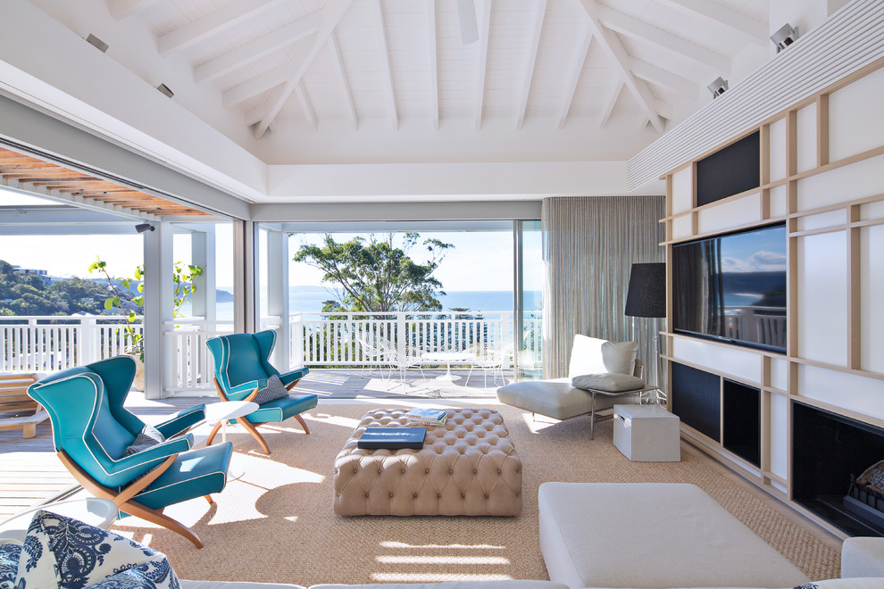 Design ideas for a beach style family room in Other.