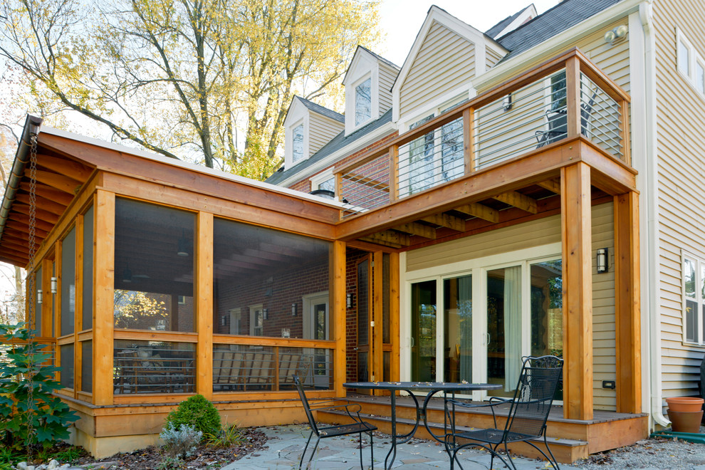 This is an example of a mid-sized modern backyard screened-in verandah in DC Metro.