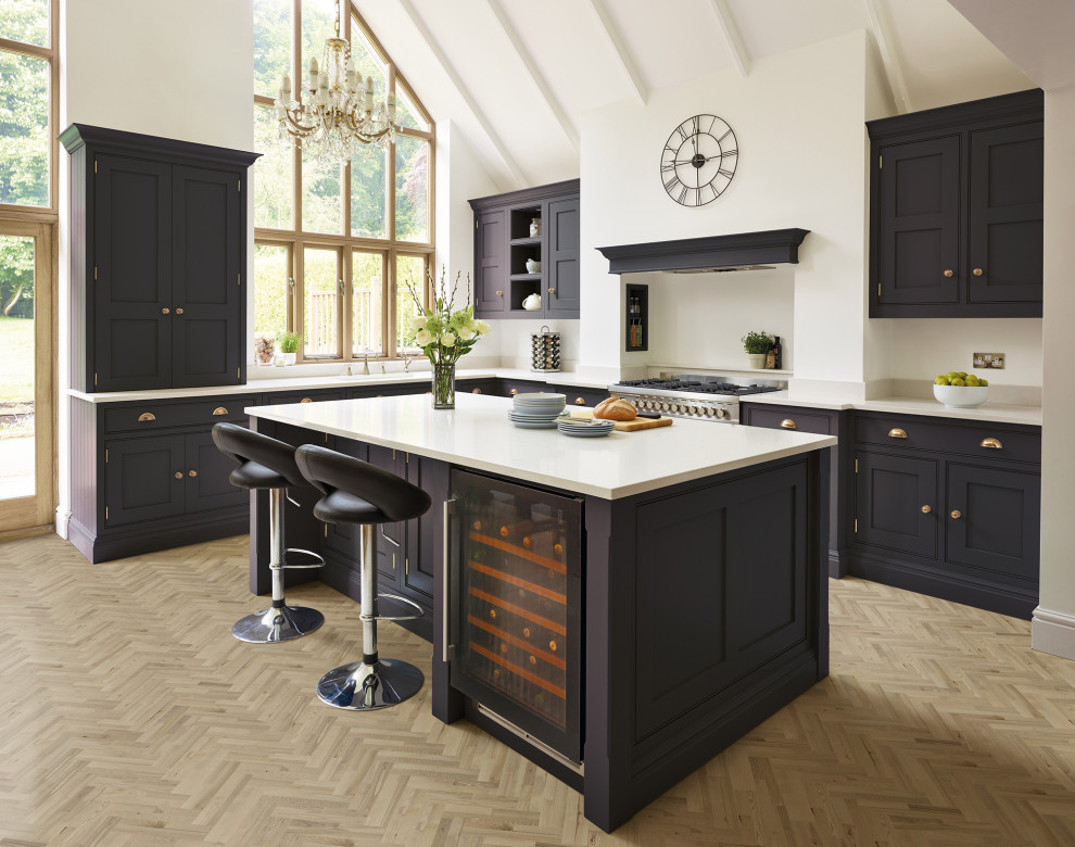 Design ideas for a large traditional l-shaped open plan kitchen in Other with shaker cabinets, purple cabinets, quartz worktops, stainless steel appliances, medium hardwood flooring, an island, brown floors and white worktops.