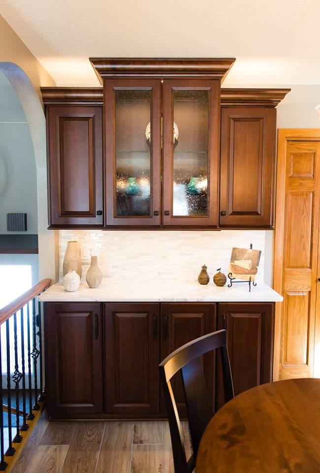 Inspiration for a transitional ceramic tile and brown floor kitchen/dining room combo remodel with beige walls