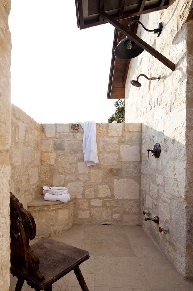 Photo of a country patio in Austin with an outdoor shower.