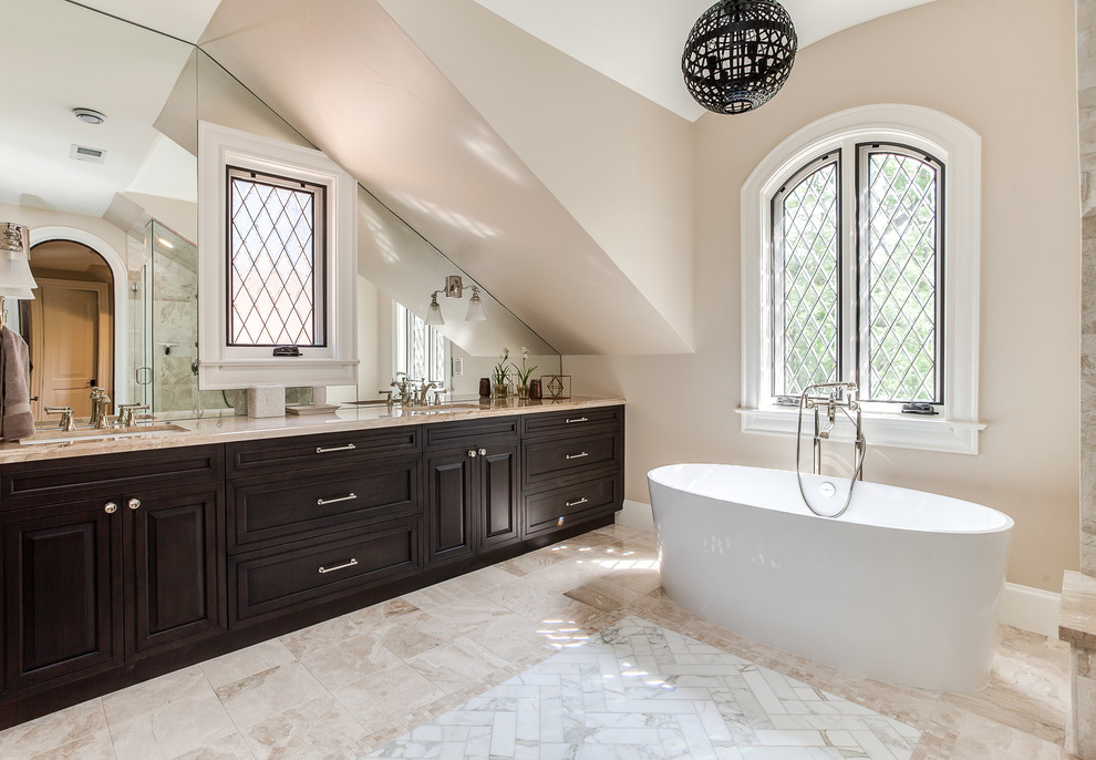 Example of a transitional bathroom design in Denver