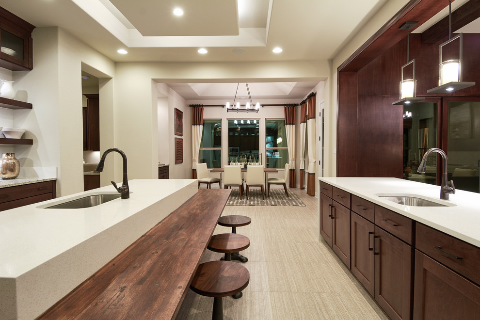 This is an example of a transitional kitchen in Austin.