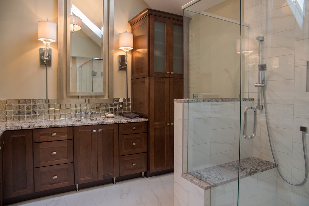 Example of a large transitional master white tile and ceramic tile ceramic tile double shower design in Cleveland with an undermount sink, shaker cabinets, medium tone wood cabinets, granite countertops and beige walls