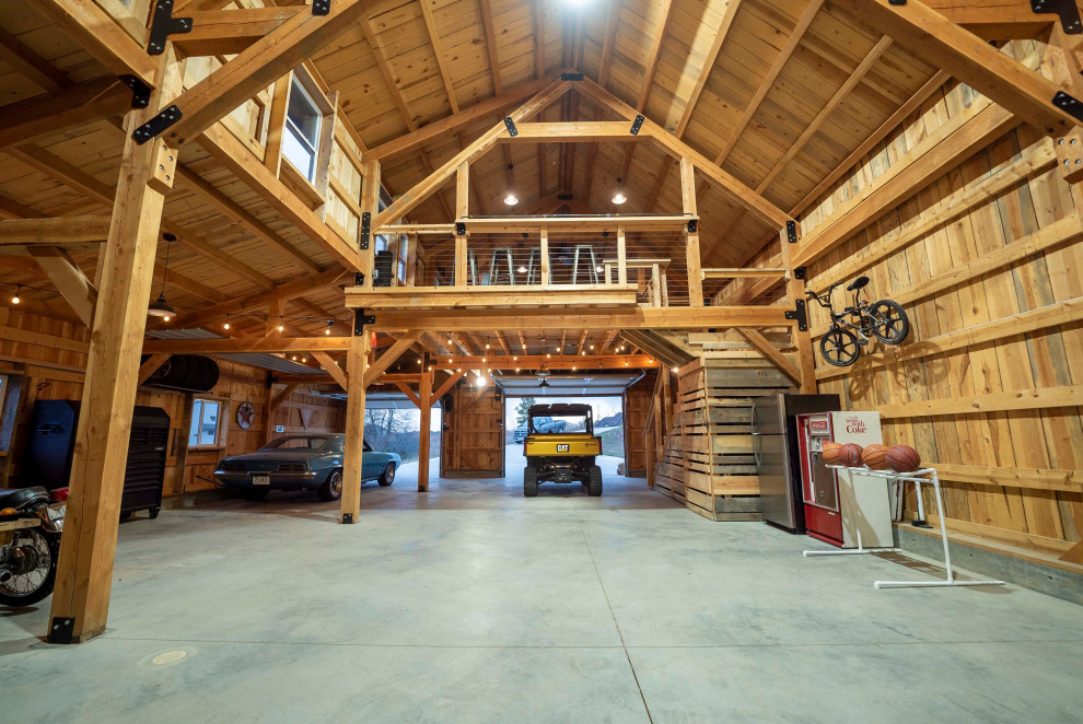 Garage workshop - large rustic detached two-car garage workshop idea