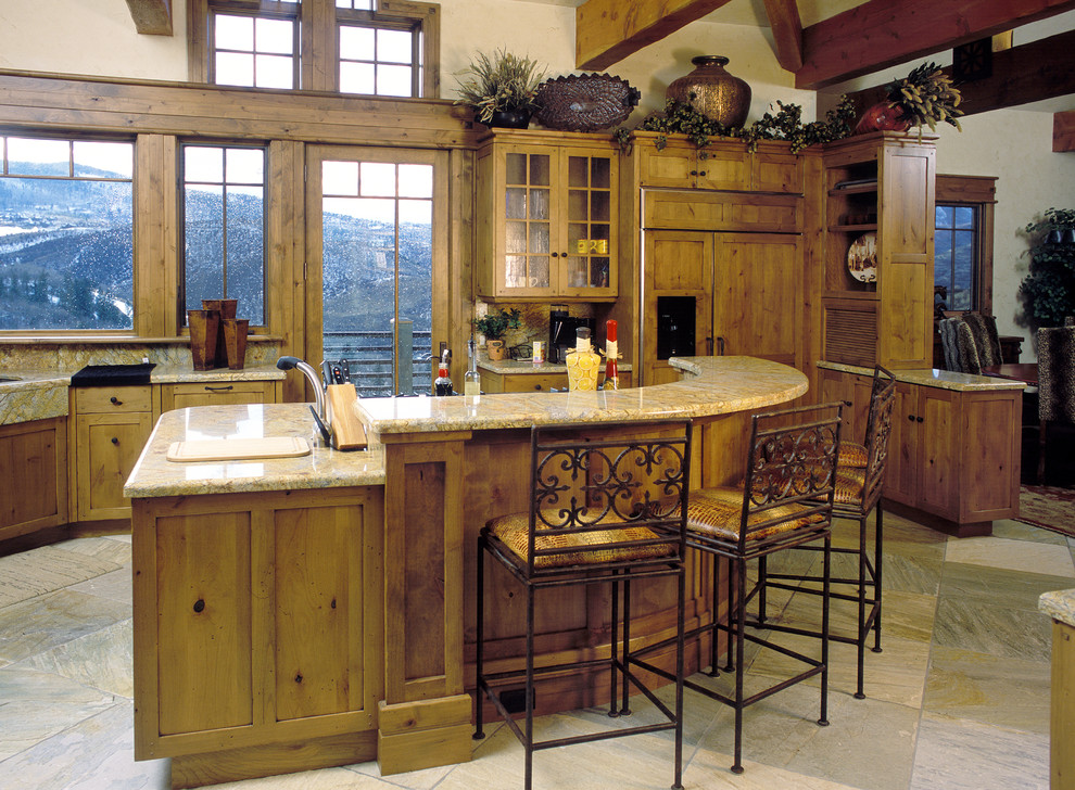 Photo of a mid-sized country u-shaped separate kitchen in Denver with a farmhouse sink, shaker cabinets, light wood cabinets, granite benchtops, black appliances, with island, multi-coloured floor and multi-coloured benchtop.