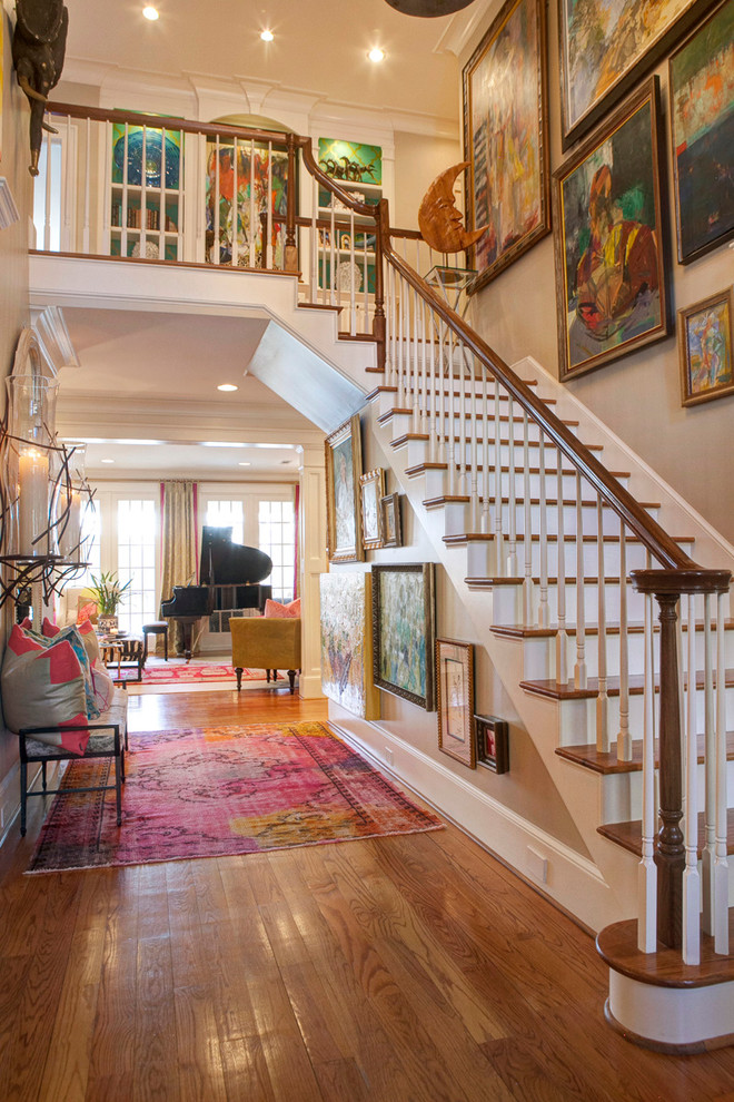 Design ideas for a large eclectic foyer in Other with beige walls.