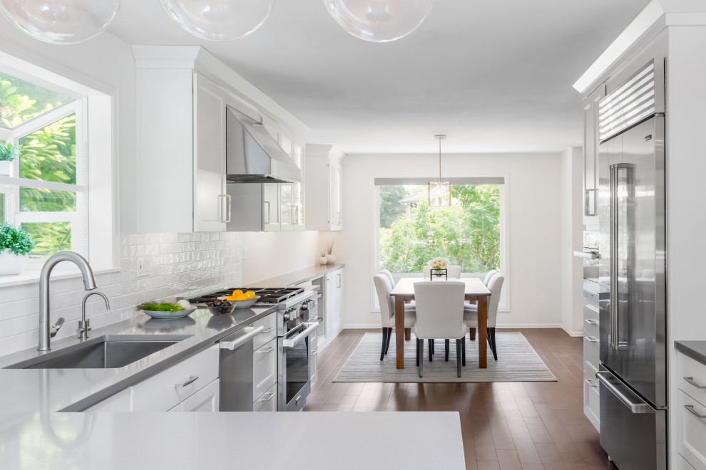 Example of a transitional kitchen design in Seattle