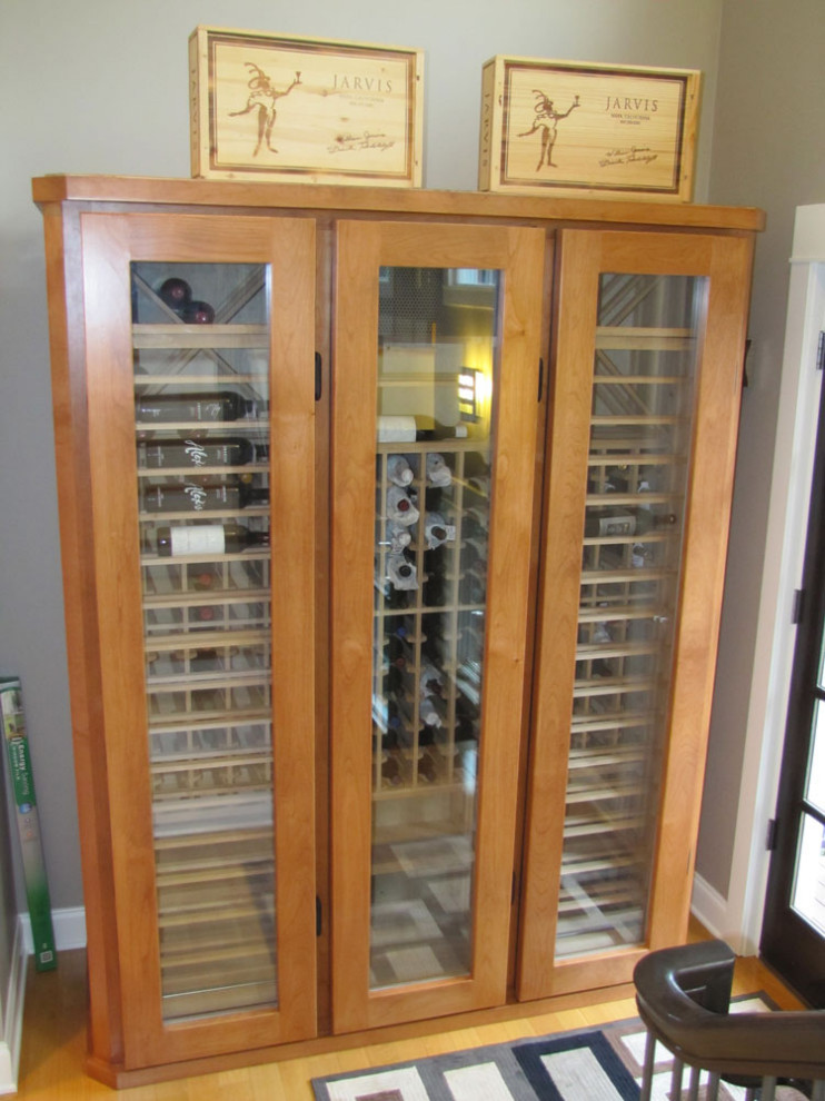 Photo of a medium sized classic wine cellar in Austin with cube storage.