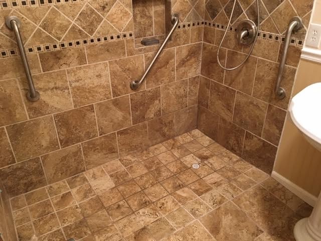 Example of a mid-sized transitional 3/4 alcove shower design with beige walls and a pedestal sink