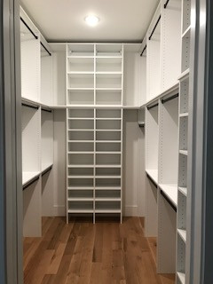 Triple-Hang Primary Closet with Floor-to-Ceiling Open Shelves