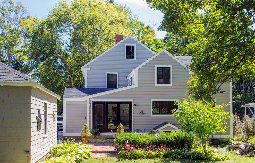 Mid-sized elegant gray two-story wood gable roof photo in Boston