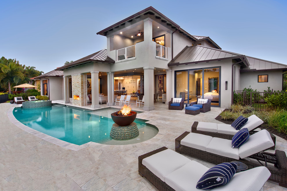 Inspiration for an expansive contemporary two-storey white exterior in Tampa.
